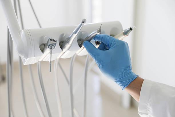 Professional Tooth Extraction technician working in Garrett, TX